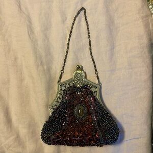 Beaded purple Handbag.